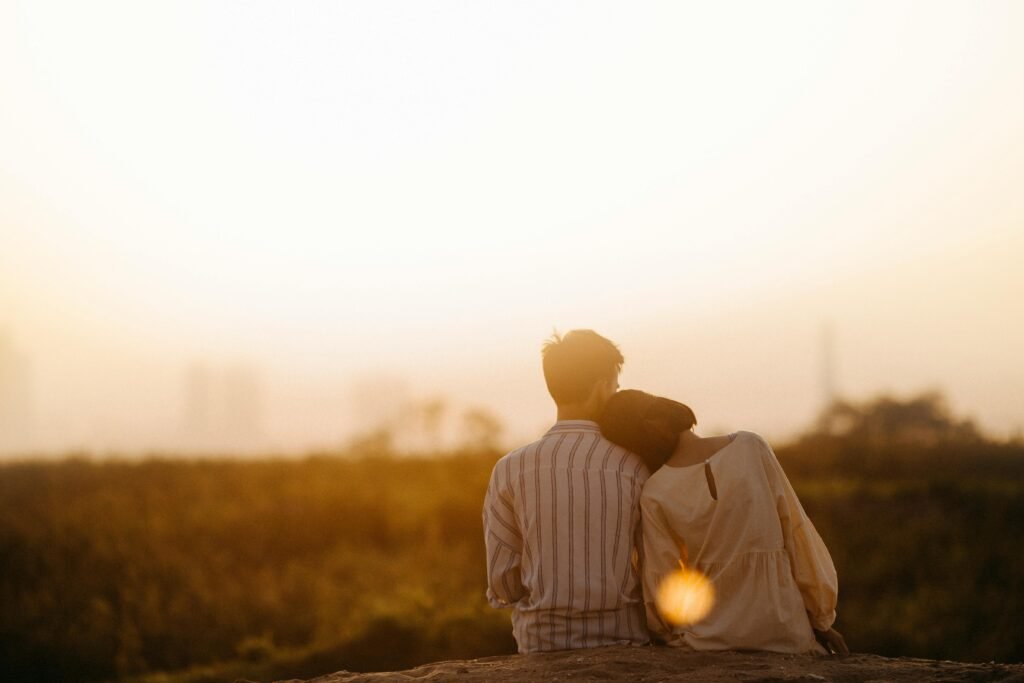 pexels-photo-1415131-1415131 A couple enjoys a serene moment together during a sunset in Gia Lai, Vietnam.